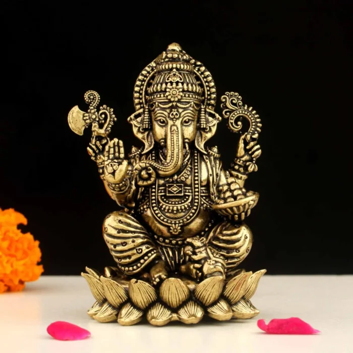 Premium brass Lord Ganesha idol with golden finish for pooja, home decor, and spiritual gifting
