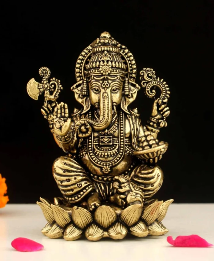 Premium brass Lord Ganesha idol with golden finish for pooja, home decor, and spiritual gifting