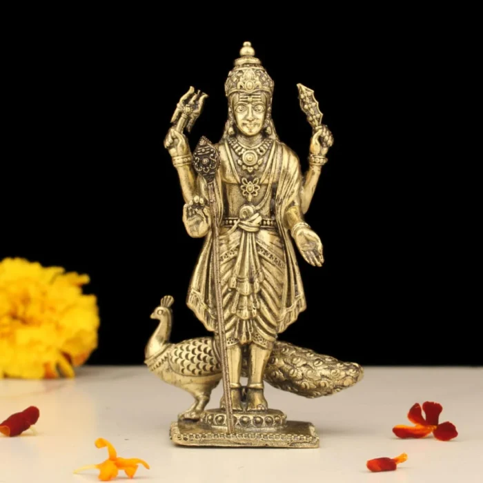 Premium brass Lord Murugan statue with peacock in golden finish for pooja, home décor, and gifting
