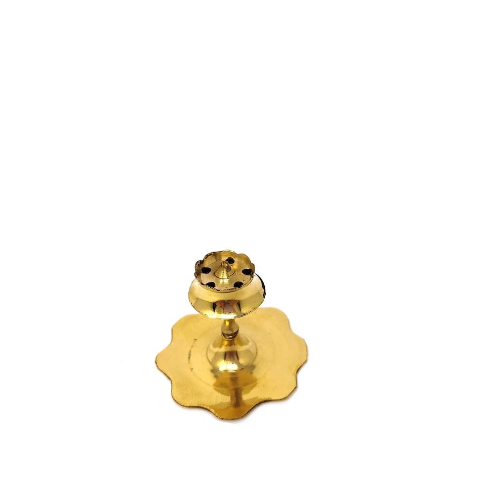 Enhance your prayer rituals with this Brass Agarbatti Stand in Kamal Thali Design, a beautifully handcrafted incense stick holder perfect for pooja mandirs, homes, and offices. The lotus thali holds multiple agarbattis securely while adding elegance and divine energy to your surroundings. Made from high-quality brass, it is sturdy, durable, and easy to maintain. Whether you're performing daily aarti or looking for a unique return gift for housewarmings, Diwali, or Navratri, this incense holder is both functional and decorative. Add a traditional touch to your spiritual space today.