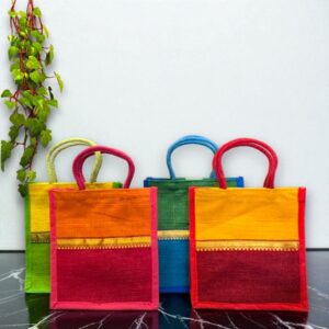 Silk border design eco-friendly jute bag with assorted prints for return gifts
